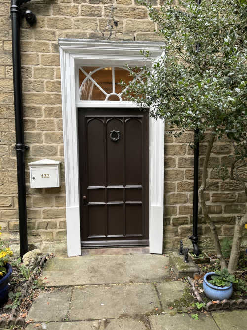 A historic timber door rebuilt by JHC